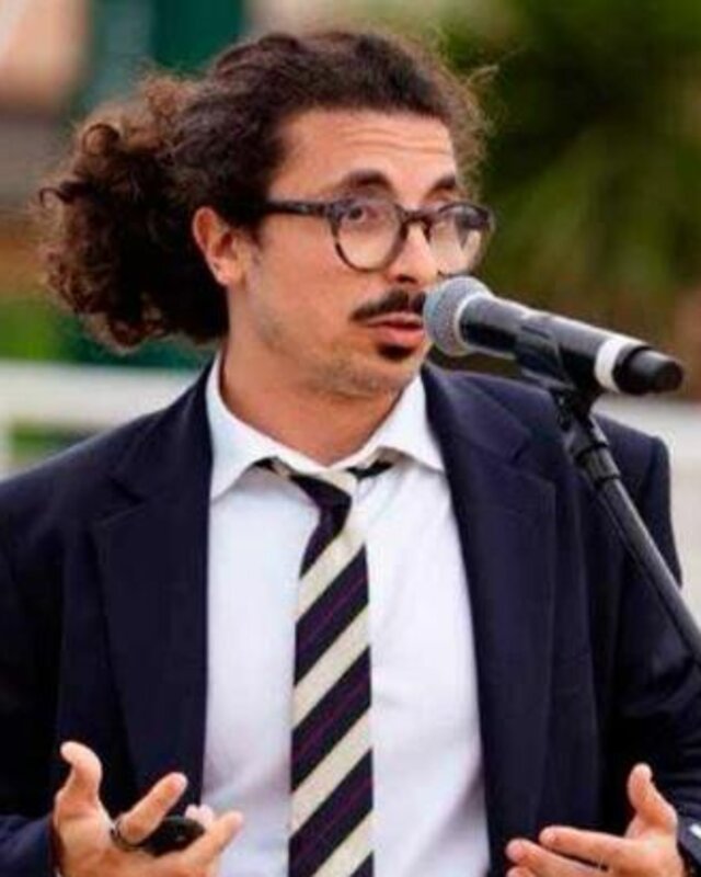 José Quintas speaking at a public event.